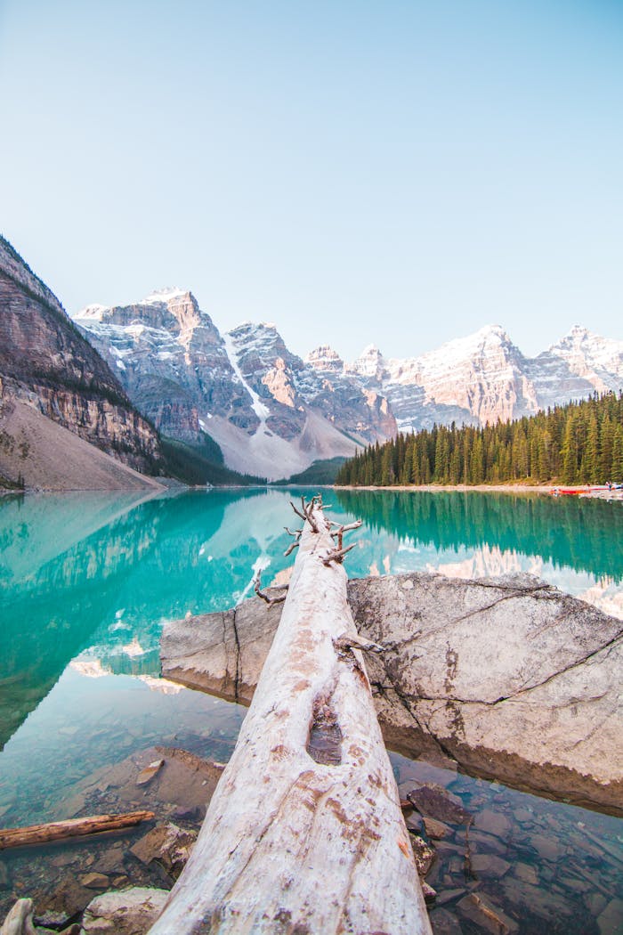 creative-03 Stunning view of Moraine Lake with snowy peaks and clear turquoise waters in Banff National Park.